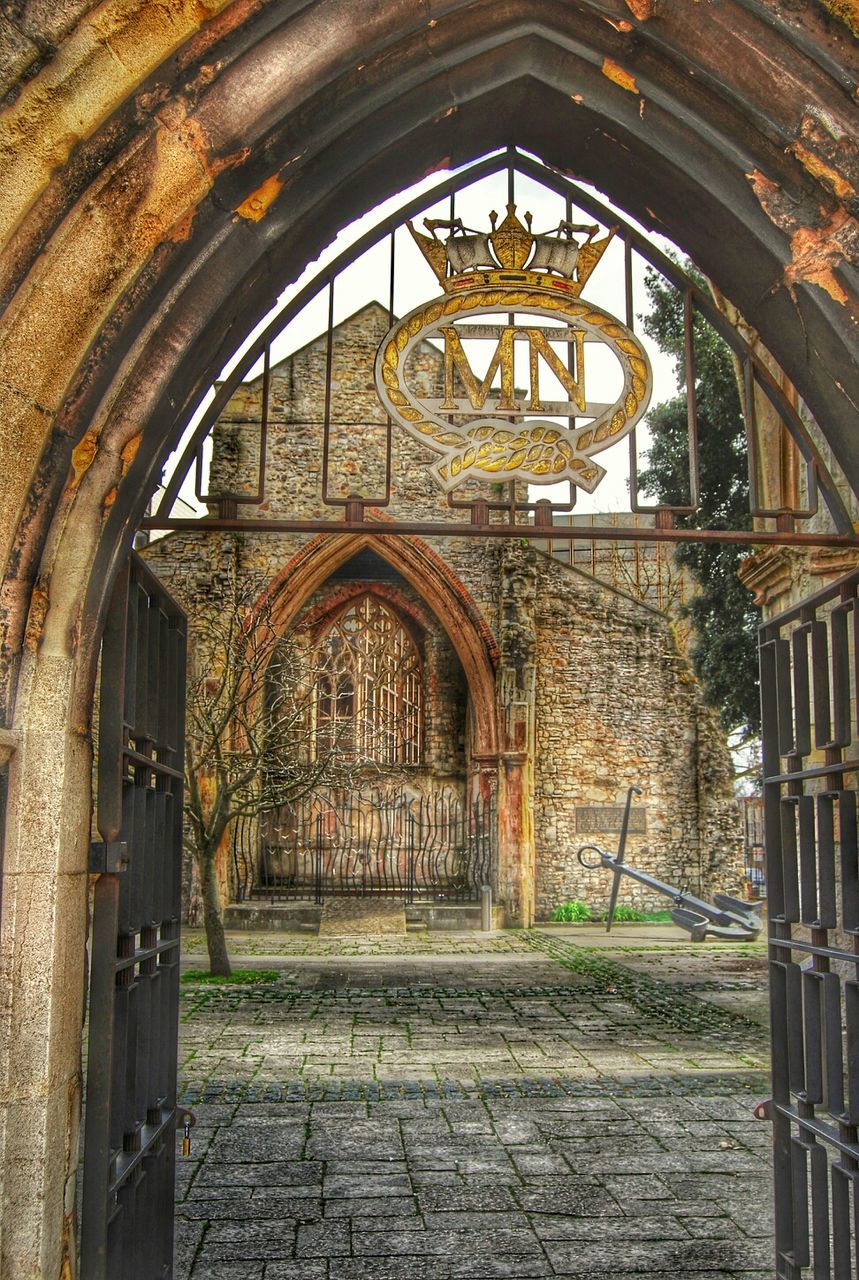 Open gate to old church