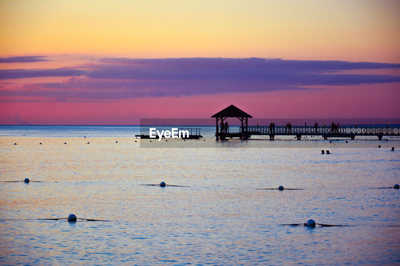 VIEW OF SEA AT SUNSET