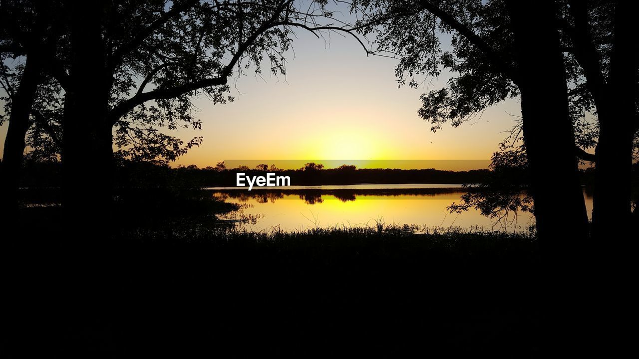 SUNSET OVER LAKE