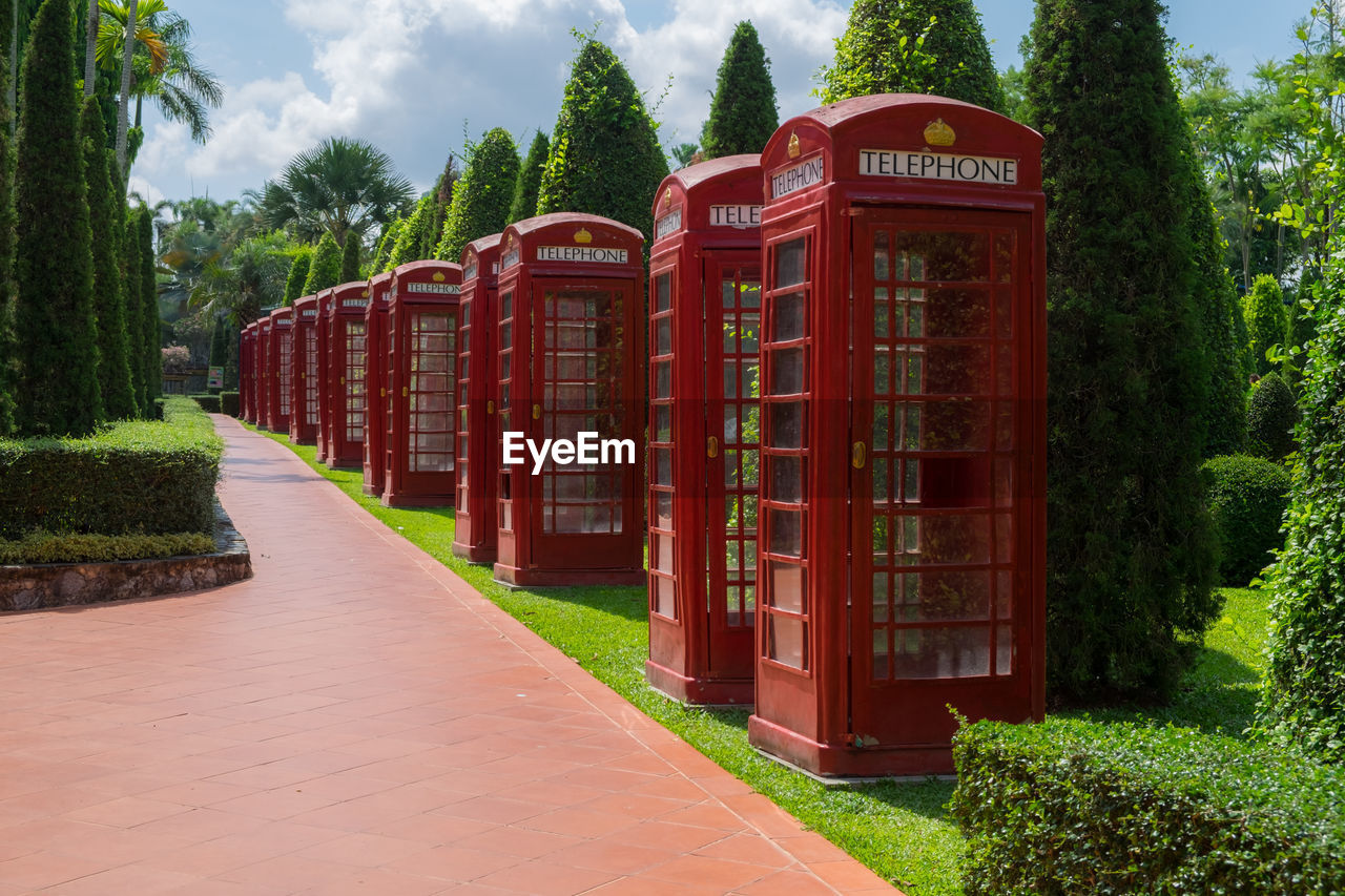 Classic red british telephone box - image