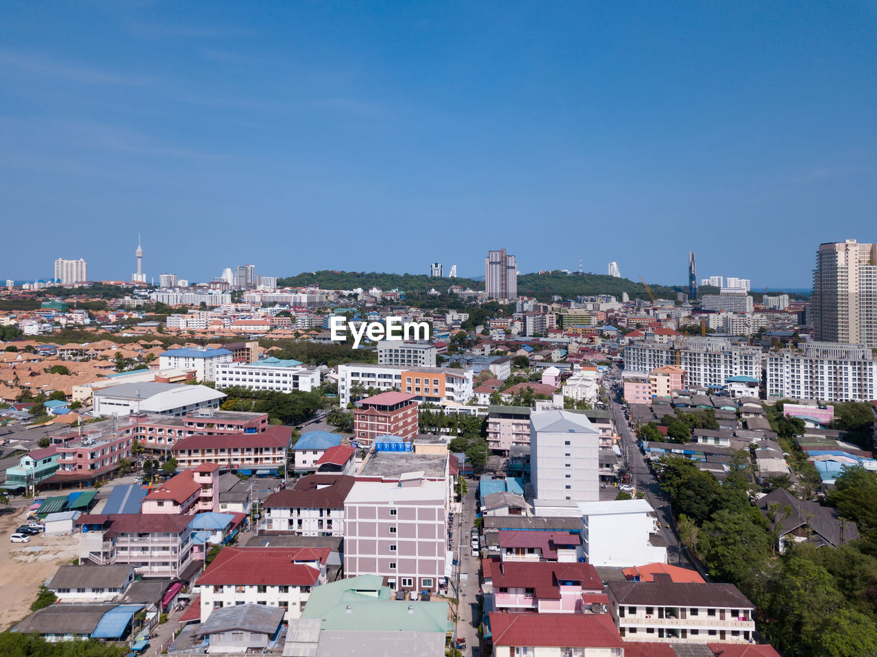 High angle view of townscape against blue sky