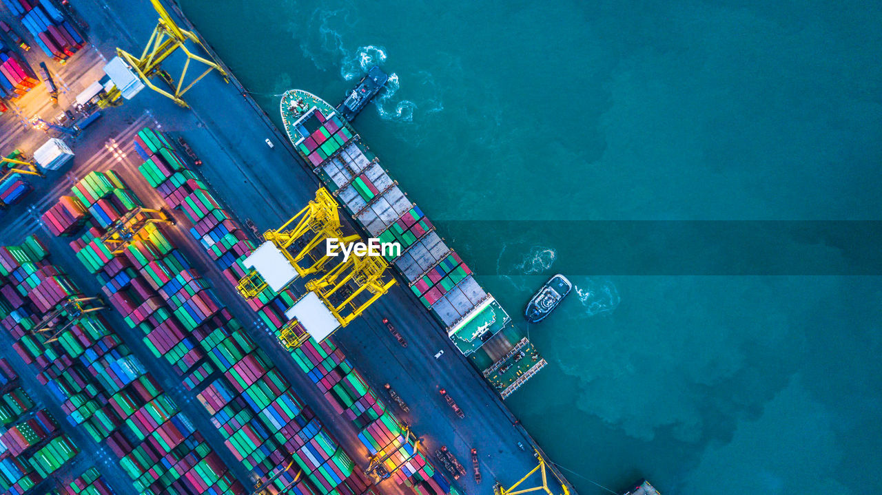 High angle view of container ship at commercial dock