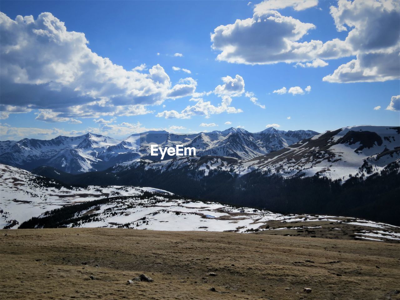 SCENIC VIEW OF MOUNTAINS AGAINST SKY DURING WINTER