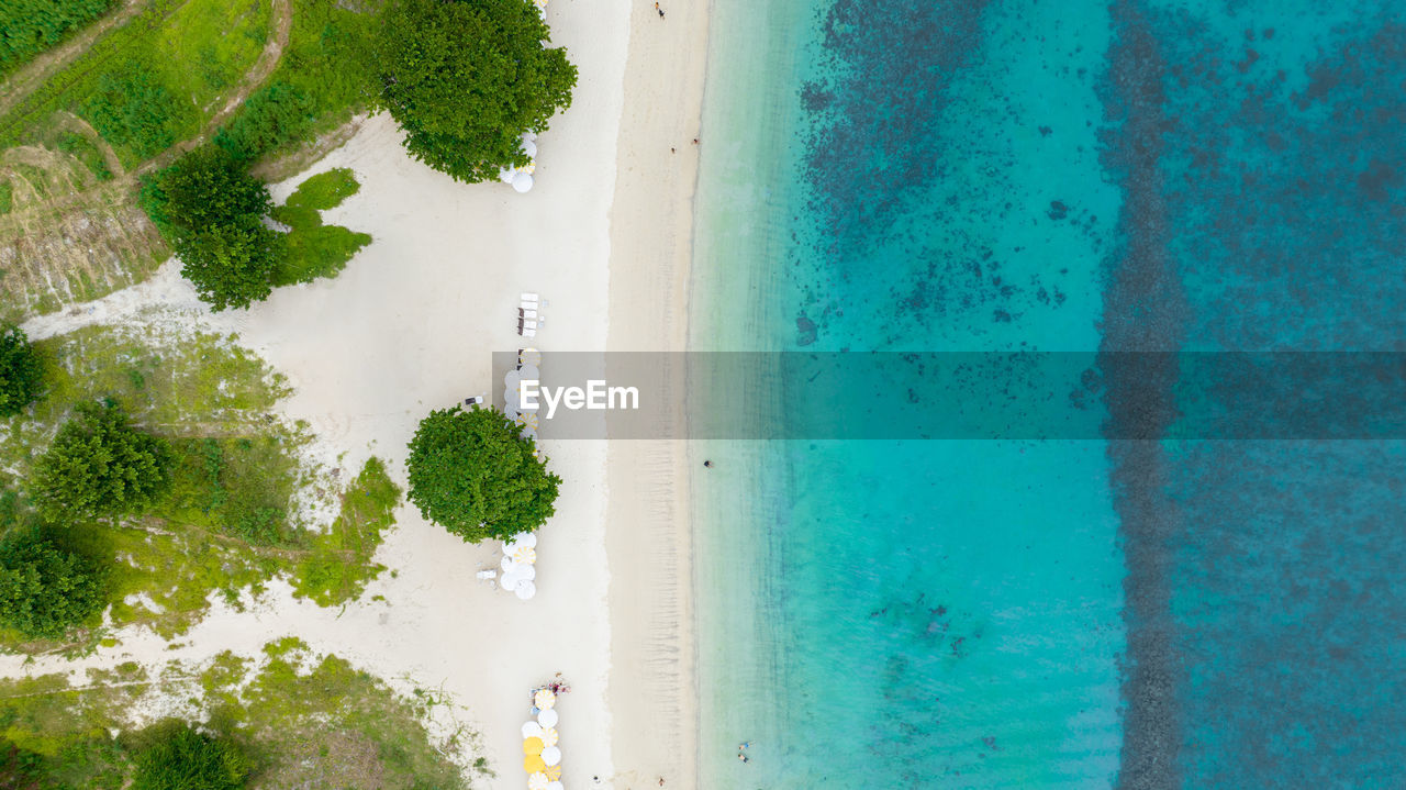 water, land, sea, aerial view, green, nature, beach, plant, high angle view, travel, environment, scenics - nature, tree, beauty in nature, day, blue, outdoors, landscape, travel destinations, no people, coastline, tourism, tranquility, lagoon, vacation, trip, coast, summer, holiday, transportation, island, turquoise colored, architecture, tranquil scene, idyllic, tropical climate, swimming pool, sports