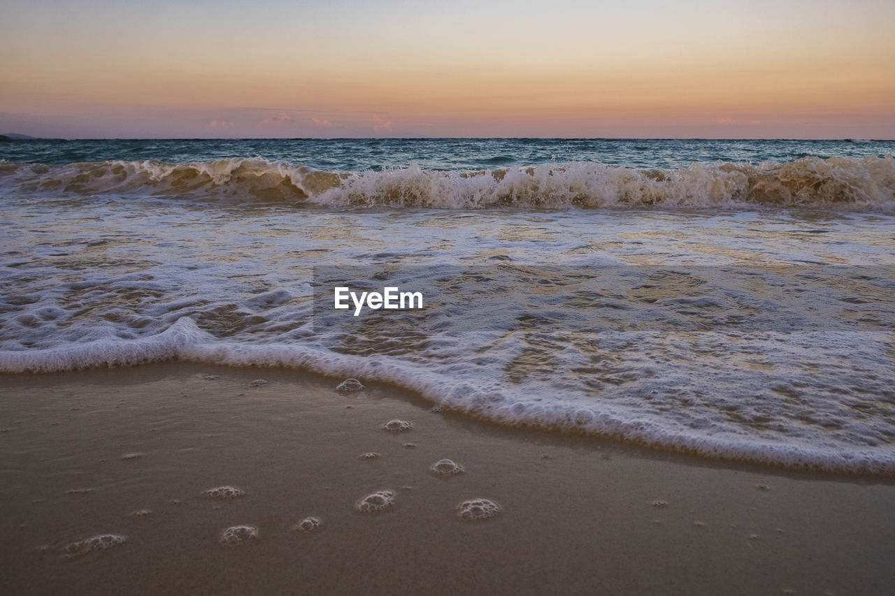 Scenic view of beach during sunset