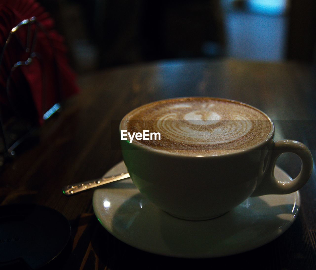 Close-up of coffee cup on table