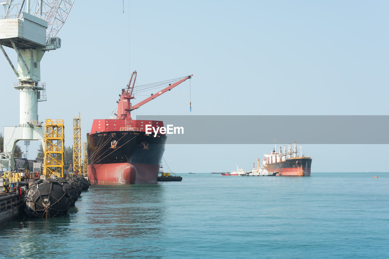 SHIP IN SEA AGAINST SKY