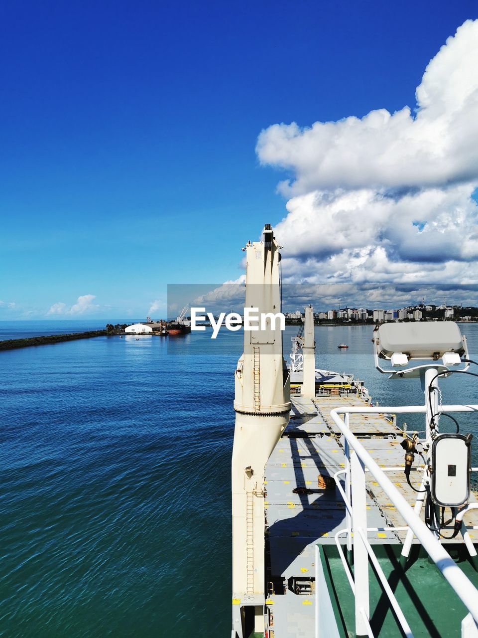 HARBOR AGAINST BLUE SKY