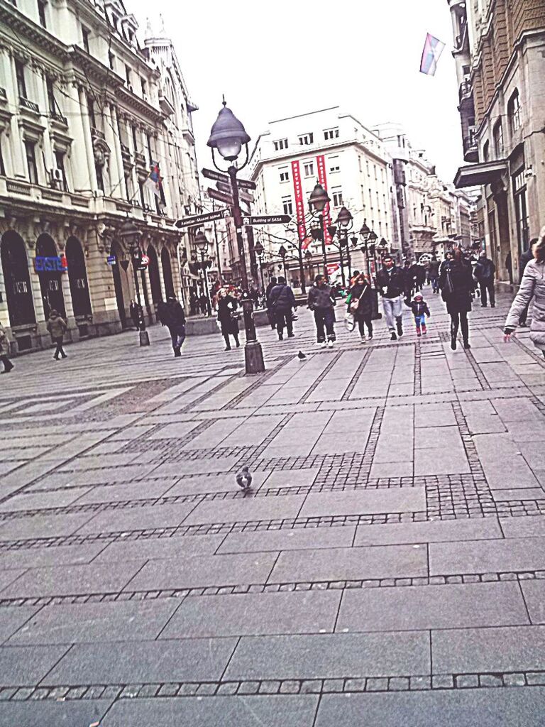 PEOPLE WALKING IN CITY