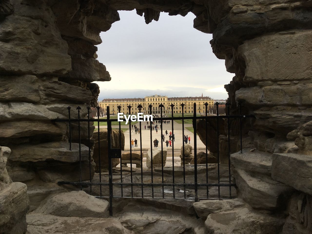 architecture, ancient history, built structure, arch, history, nature, rock, the past, travel destinations, sky, water, temple, travel, building, cave, tourism, ruins, rock formation, outdoors, day, building exterior, no people, ancient, sea, railing, wall, formation, land, gate, old ruin