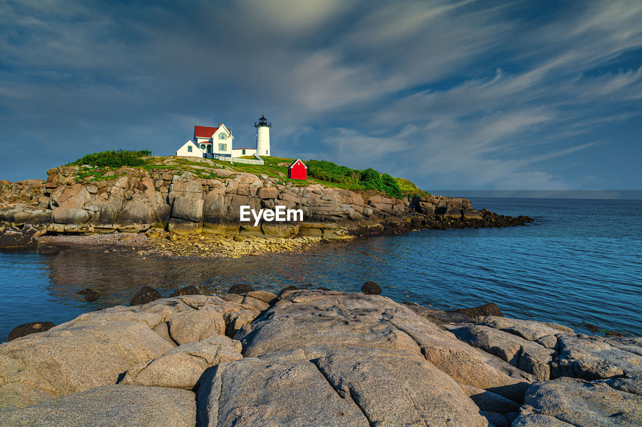 Cape neddick, maine, usa 8/02/2019. nubble light house at nubble point during low tide.