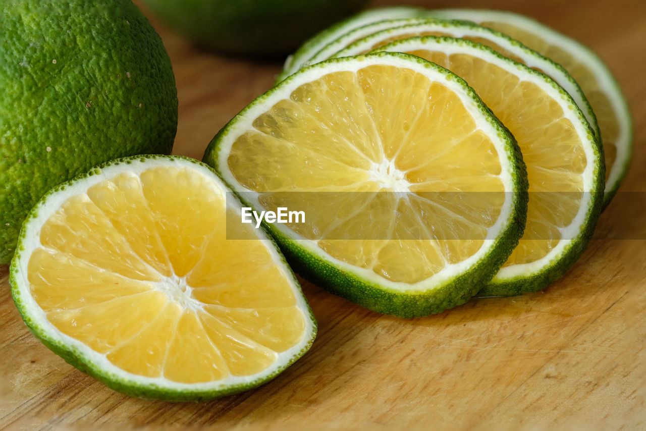 Close-up of lemon slice on cutting board