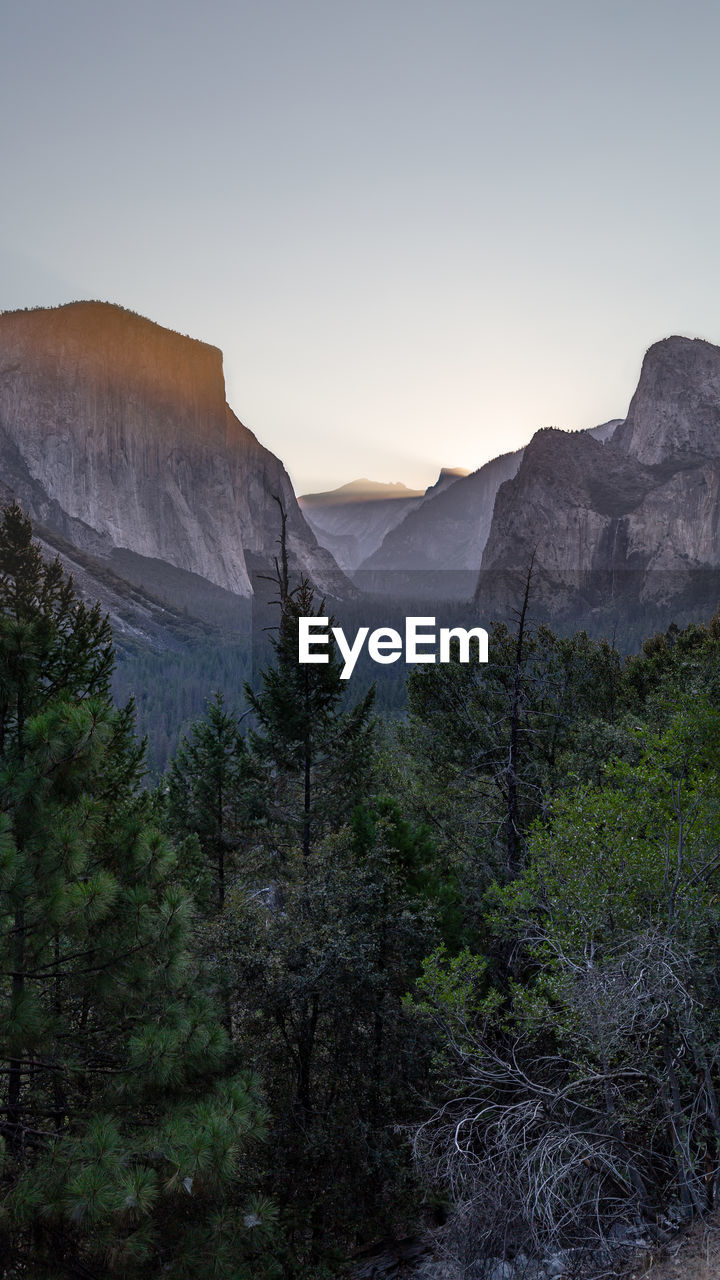 Scenic view of mountains against sky during sunset