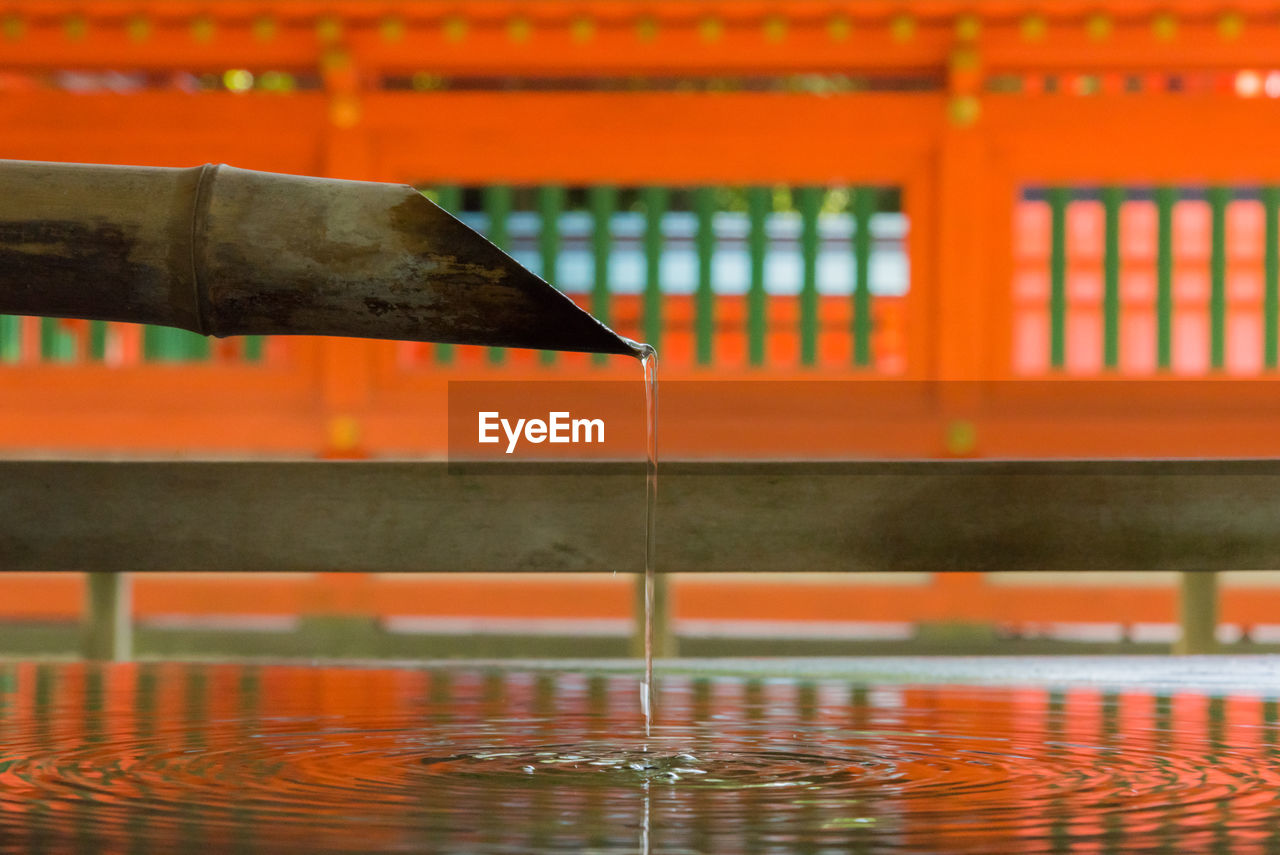 Close-up of hand wash of shrine