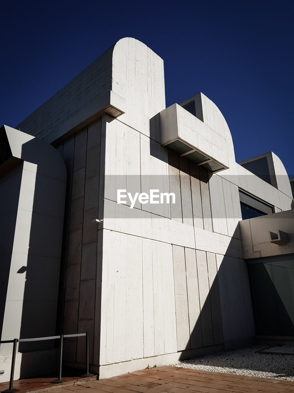 Low angle view of building against blue sky