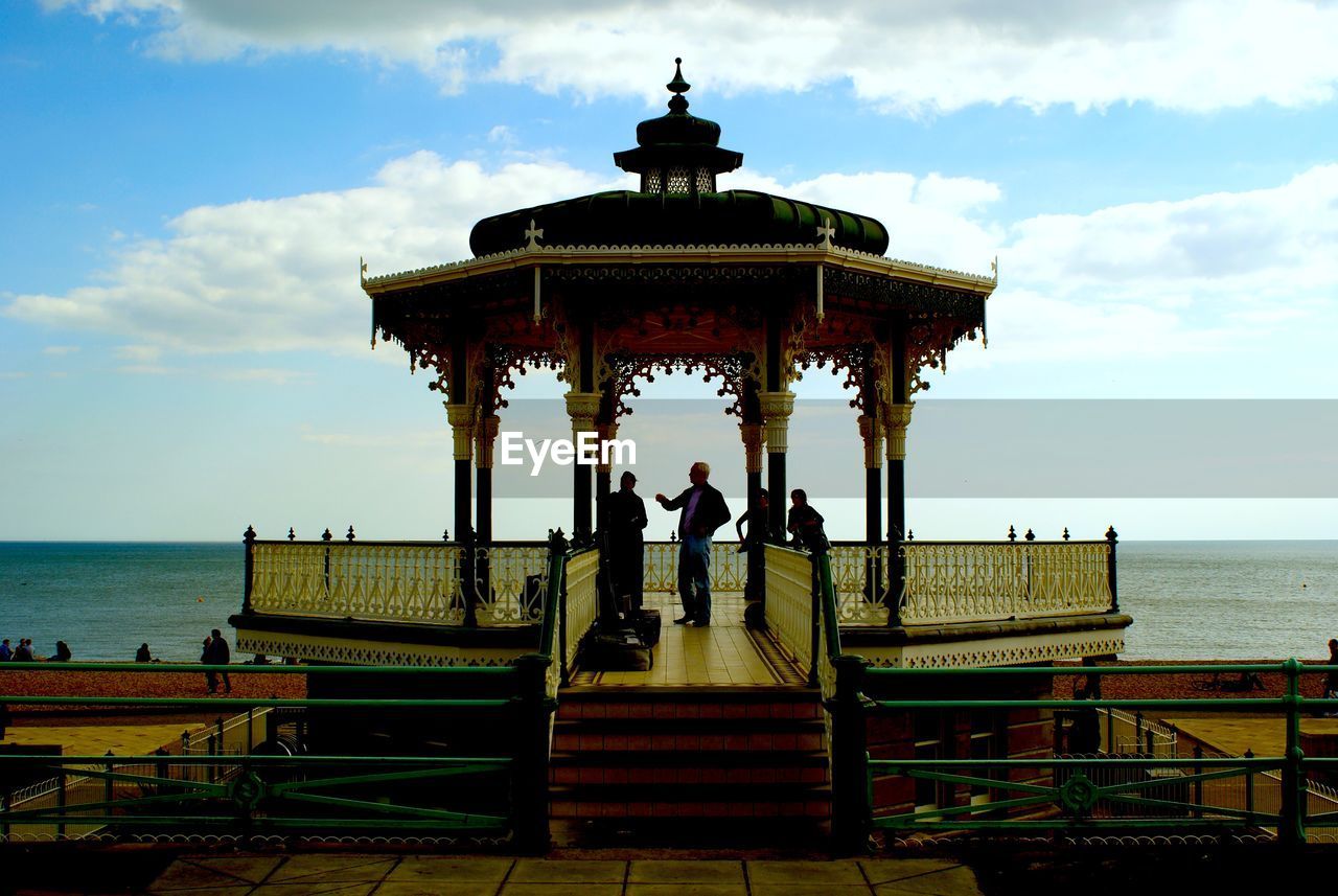 TOURISTS ON PIER