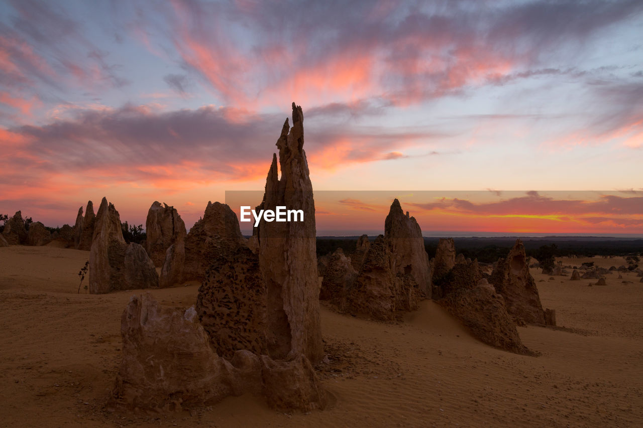 Panoramic view of land against sky during sunset