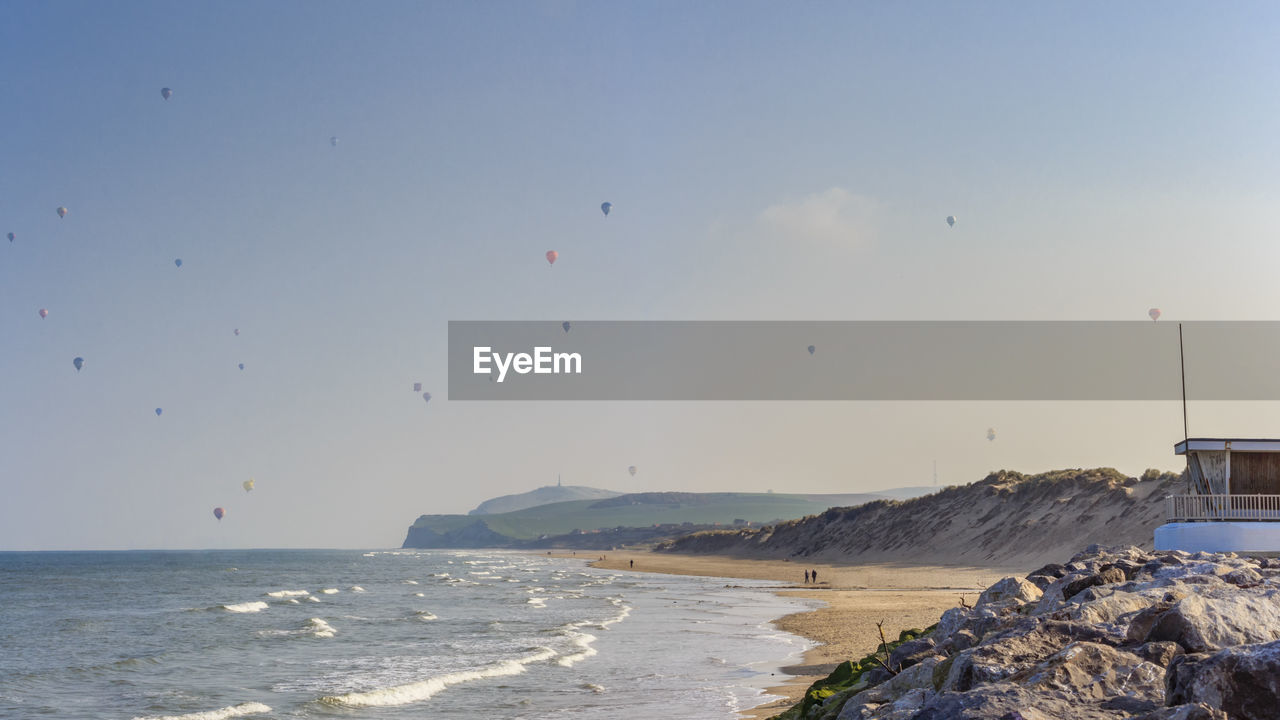 Scenic view of beach against sky