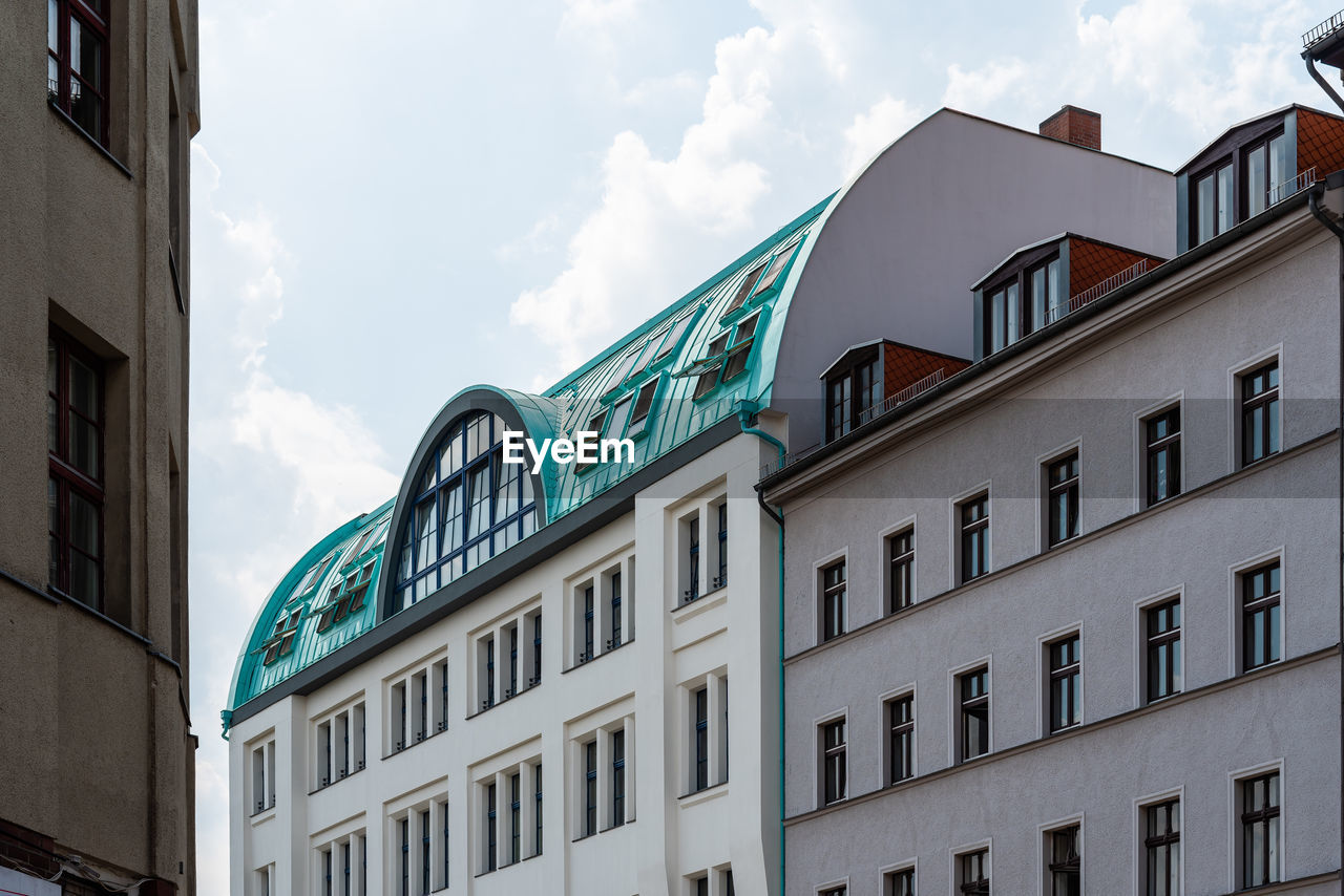 Low angle view of old residential buildings in berlin mitte.