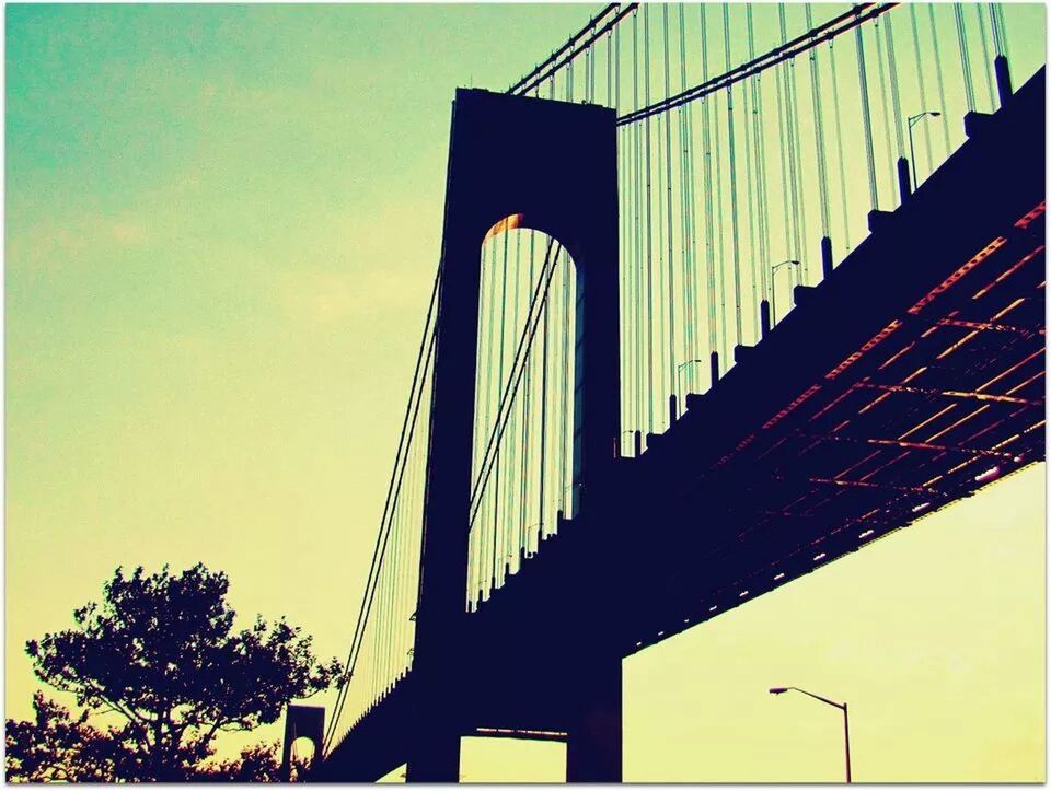 LOW ANGLE VIEW OF SUSPENSION BRIDGE