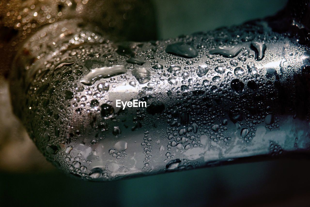 Close-up of water drops on glass