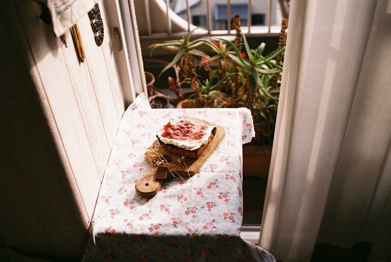 High angle view of food on cutting board over table at home