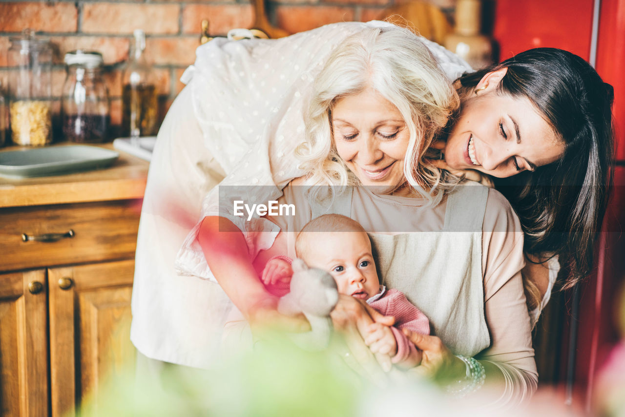 close-up of mother and daughter at home