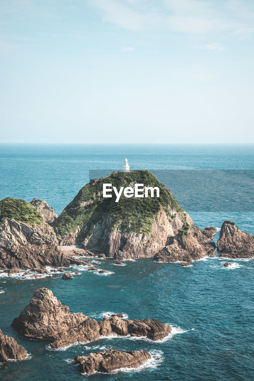 scenic view of sea against blue sky