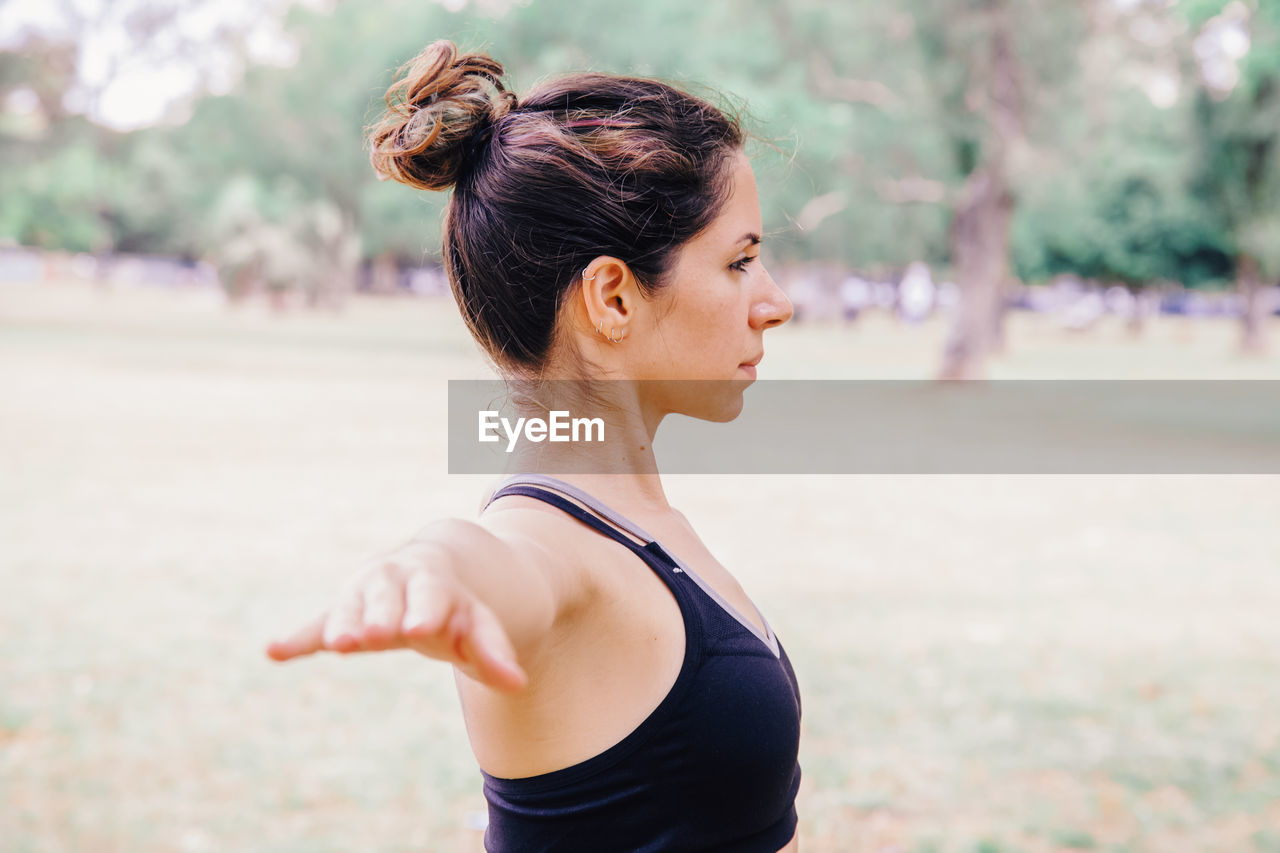 Woman exercising at park