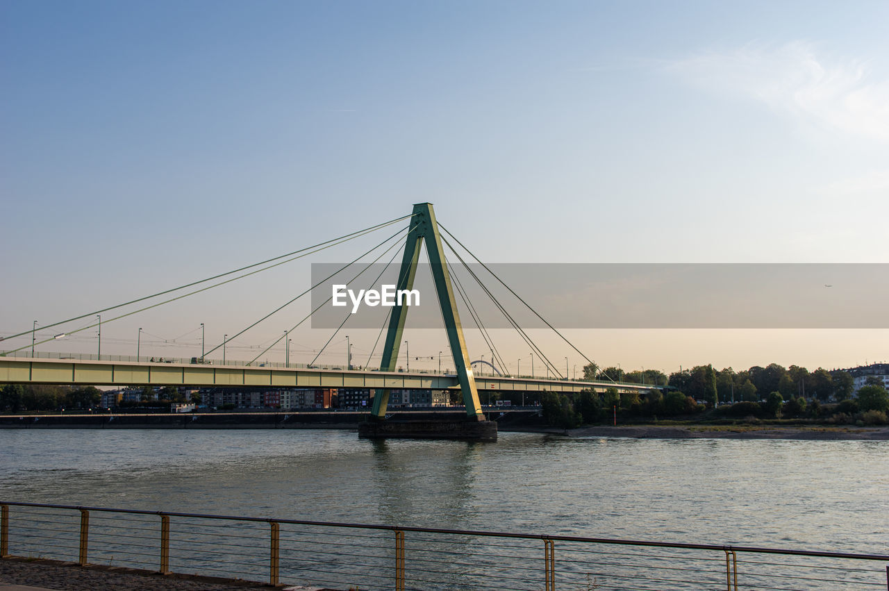 VIEW OF BRIDGE OVER RIVER AGAINST SKY