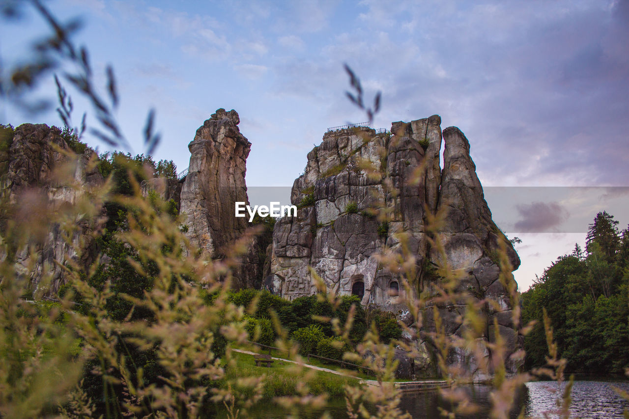 LOW ANGLE VIEW OF ROCKS AGAINST SKY