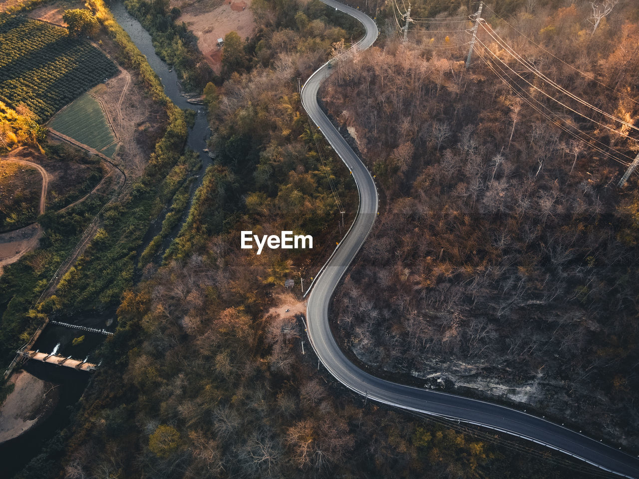 High angle view of winding road in city