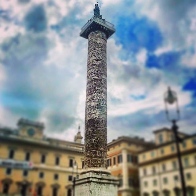 LOW ANGLE VIEW OF TOWER AGAINST CLOUDY SKY