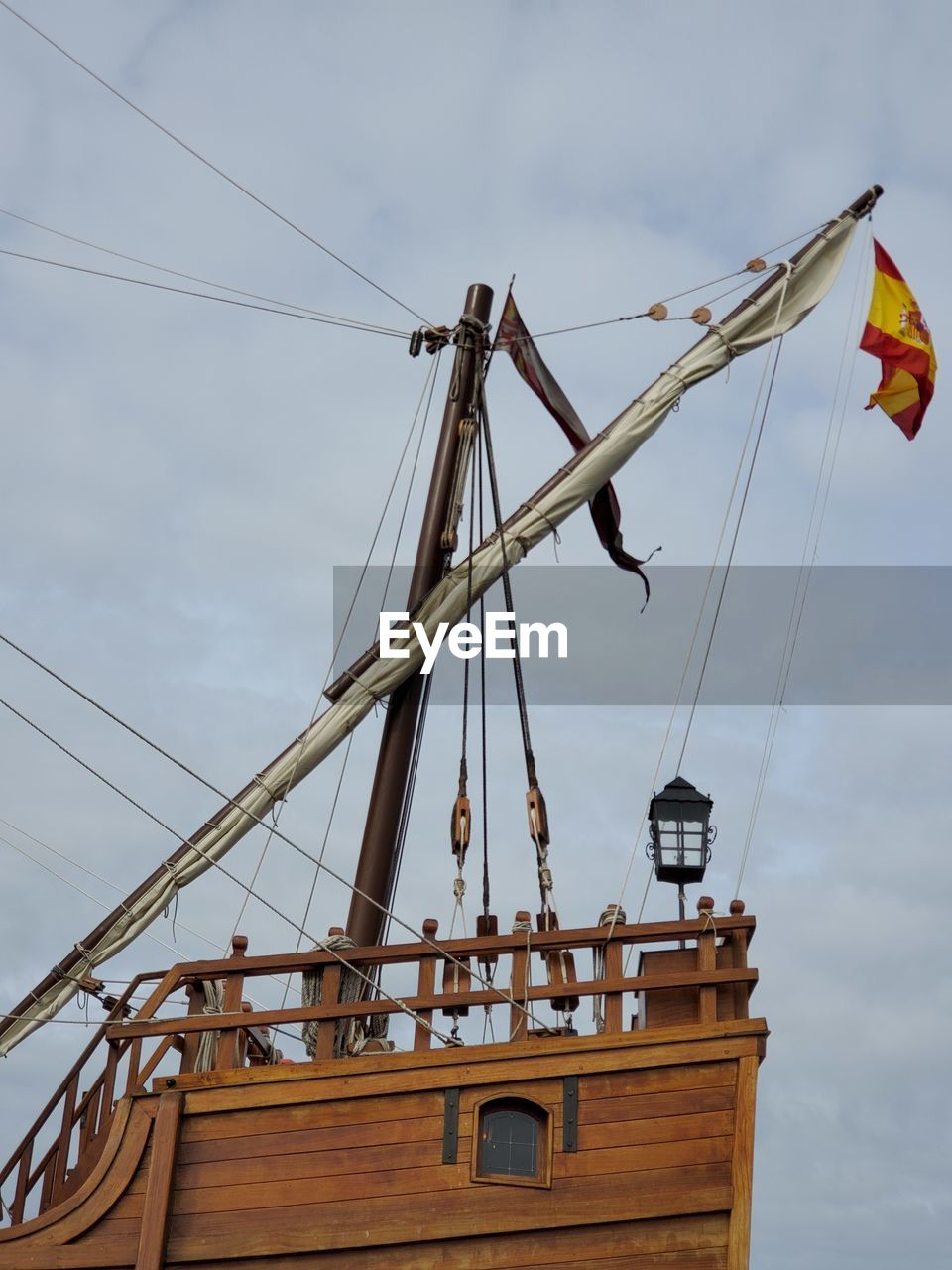 LOW ANGLE VIEW OF MAST AGAINST SKY