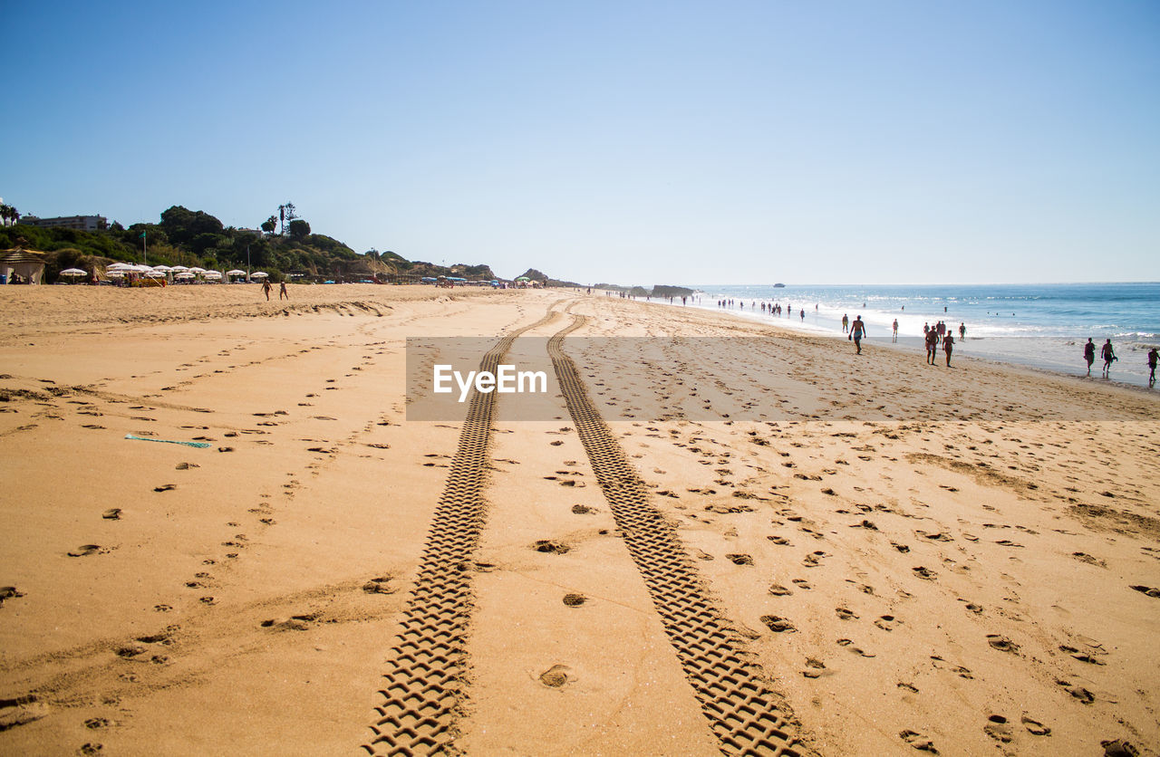 View of beach against clear sky