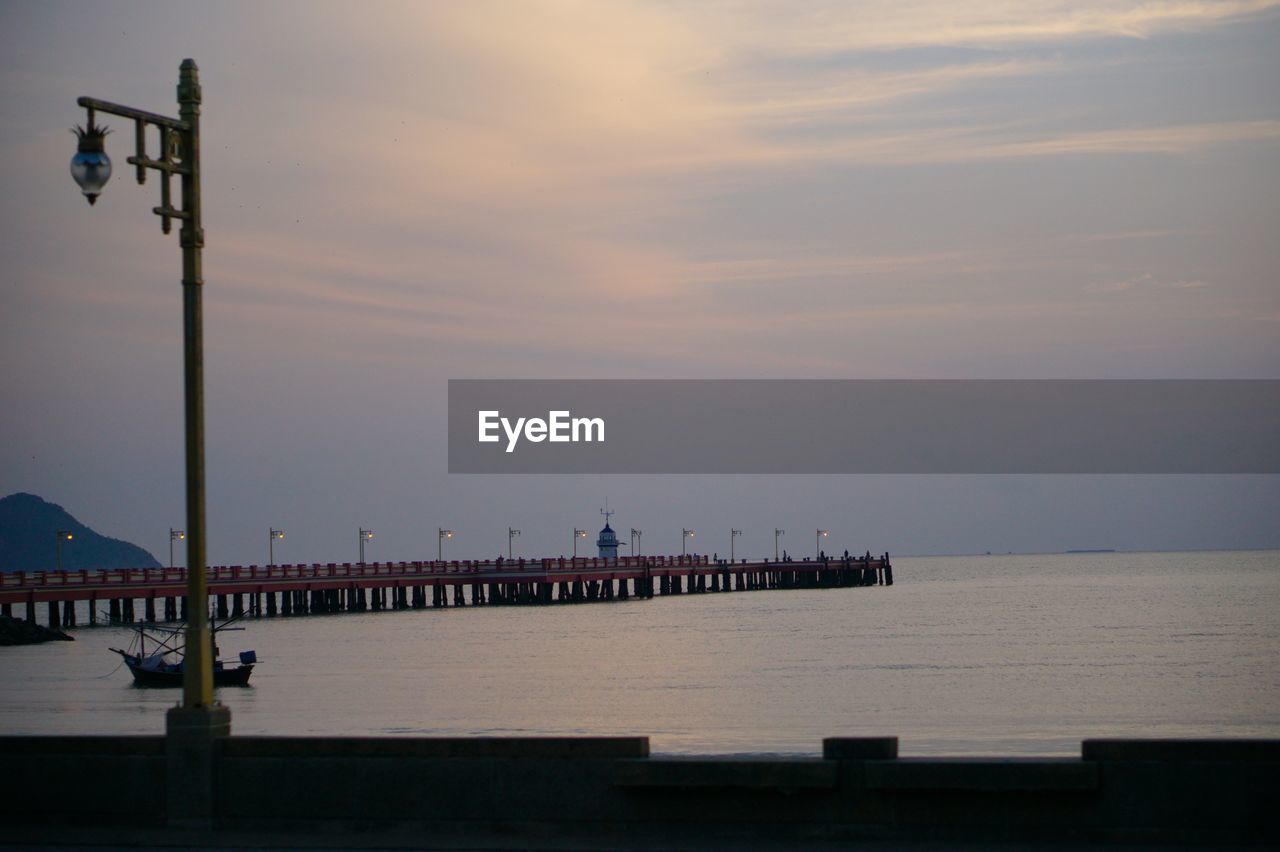 PIER OVER SEA AGAINST SKY