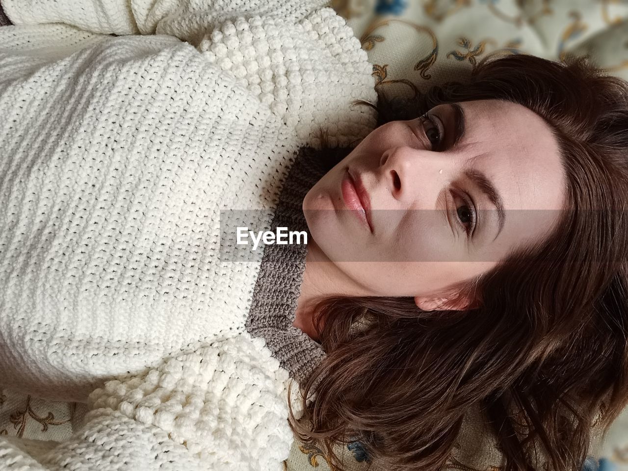 one person, lying down, women, relaxation, portrait, adult, young adult, indoors, brown hair, person, headshot, long hair, furniture, hairstyle, human face, eyes closed, clothing, lifestyles, domestic room, bed, female, blanket, portrait photography, comfortable, emotion, leisure activity, lying on back, high angle view, bedroom, sweater, resting, home interior, skin, human hair, sleeping, cozy, winter, child, casual clothing, smiling, waist up