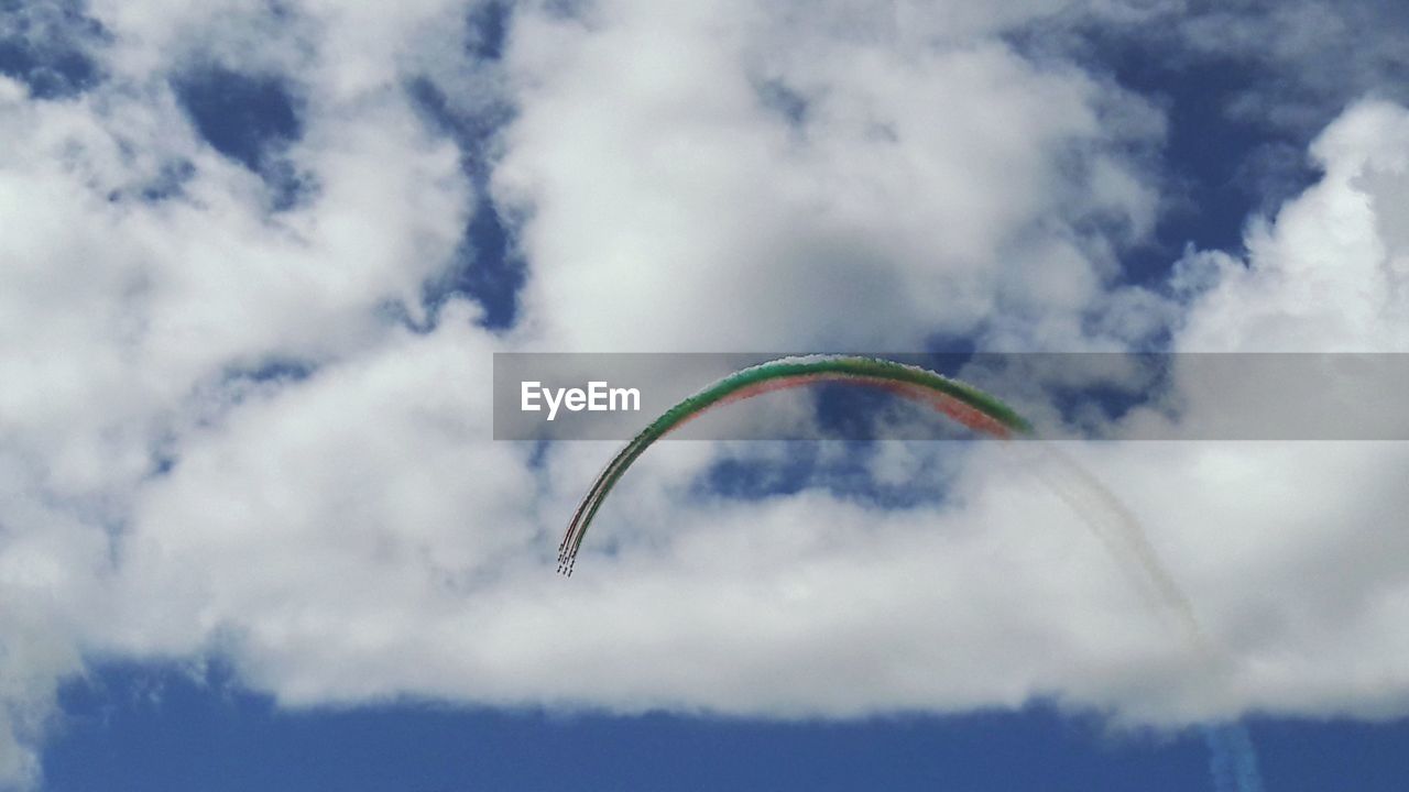 LOW ANGLE VIEW OF KITE AGAINST SKY