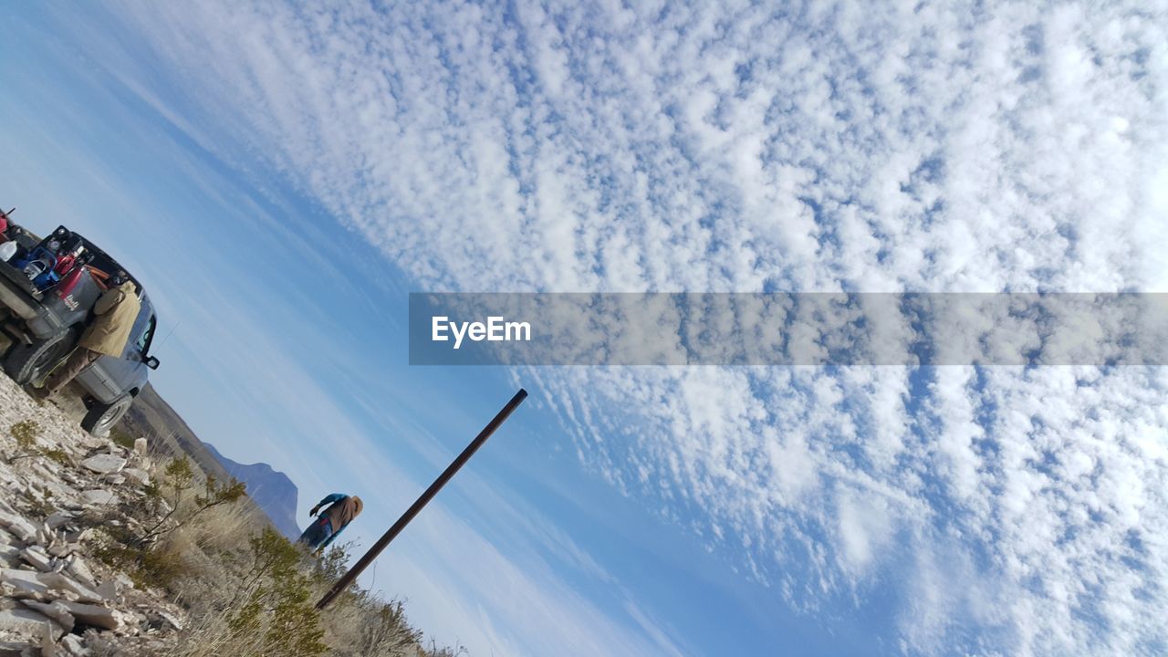 LOW ANGLE VIEW OF SKY AND CLOUDS IN THE SUNLIGHT