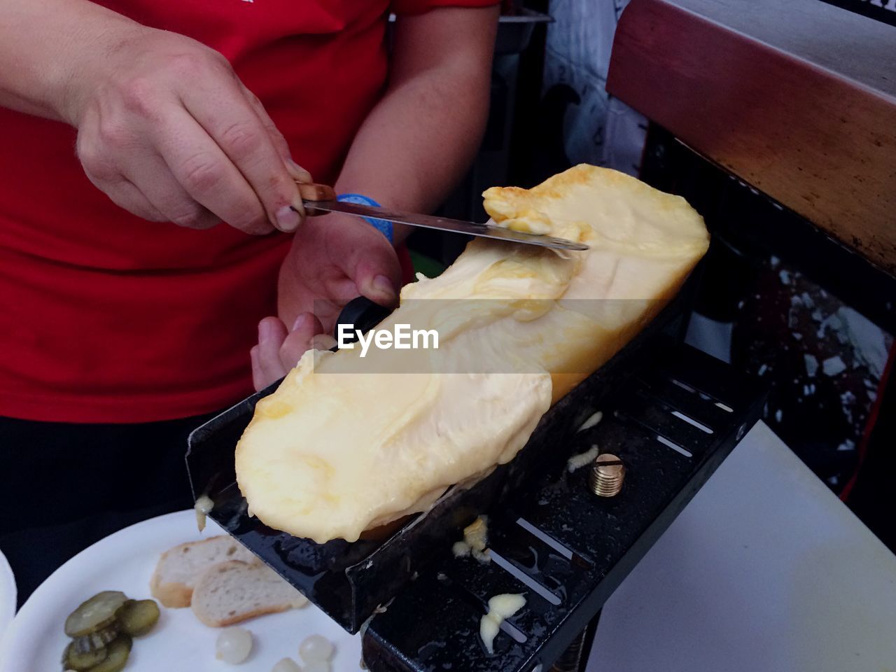 Close-up of person preparing food