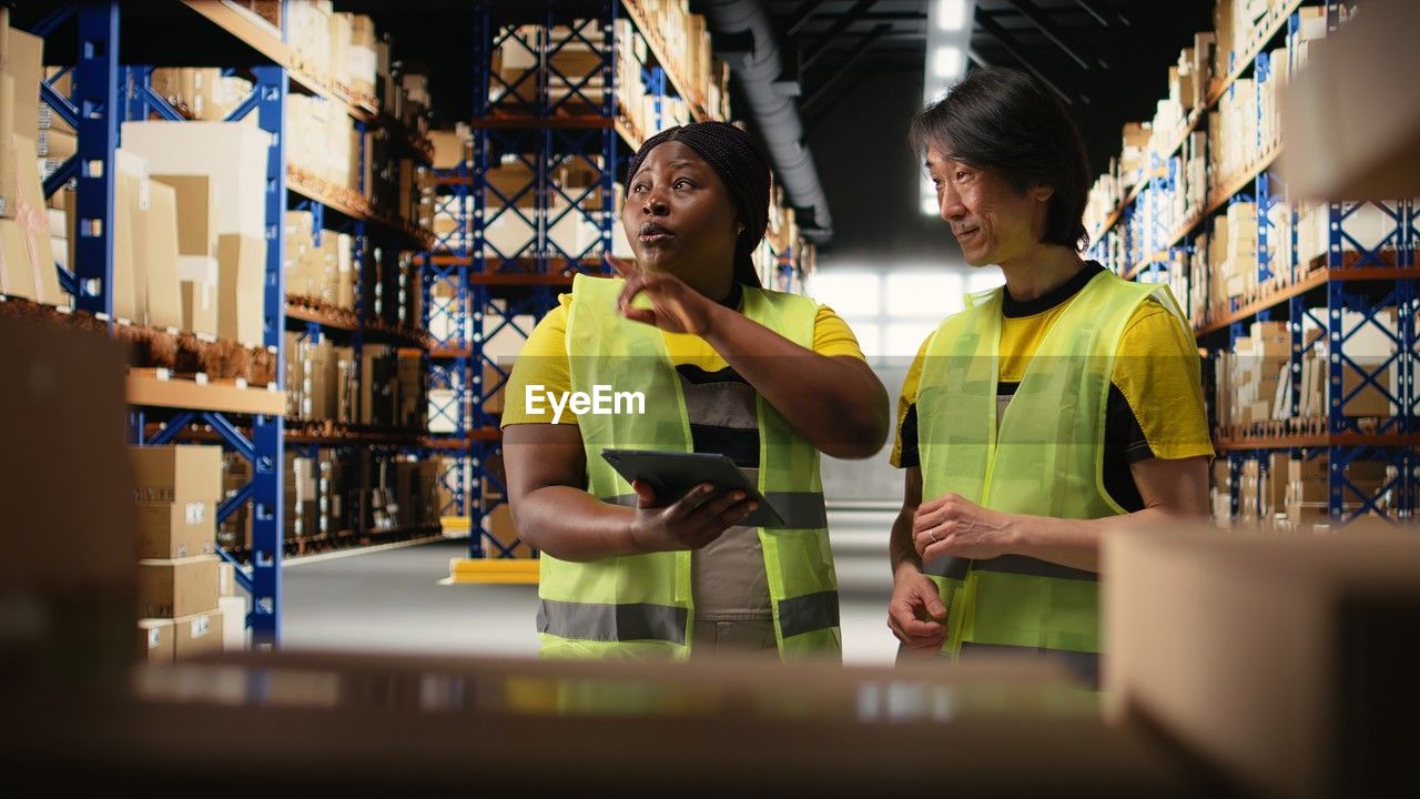 side view of woman sitting on table in cafe