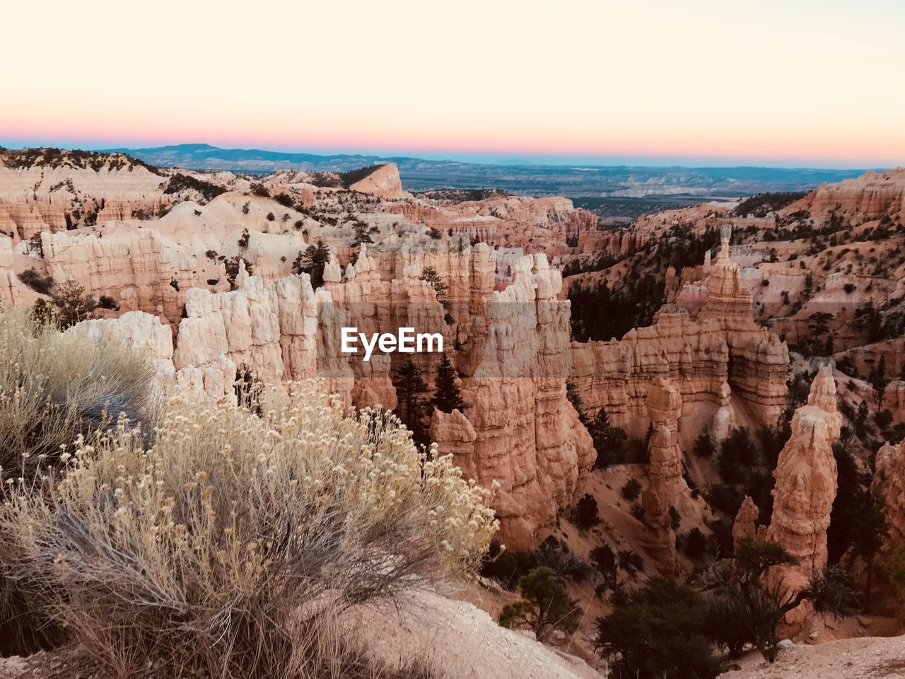 Scenic view of rock formations against sky