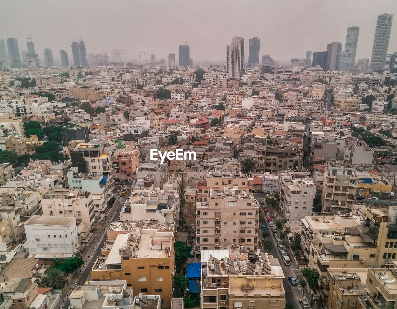 High angle view of buildings in city against sky