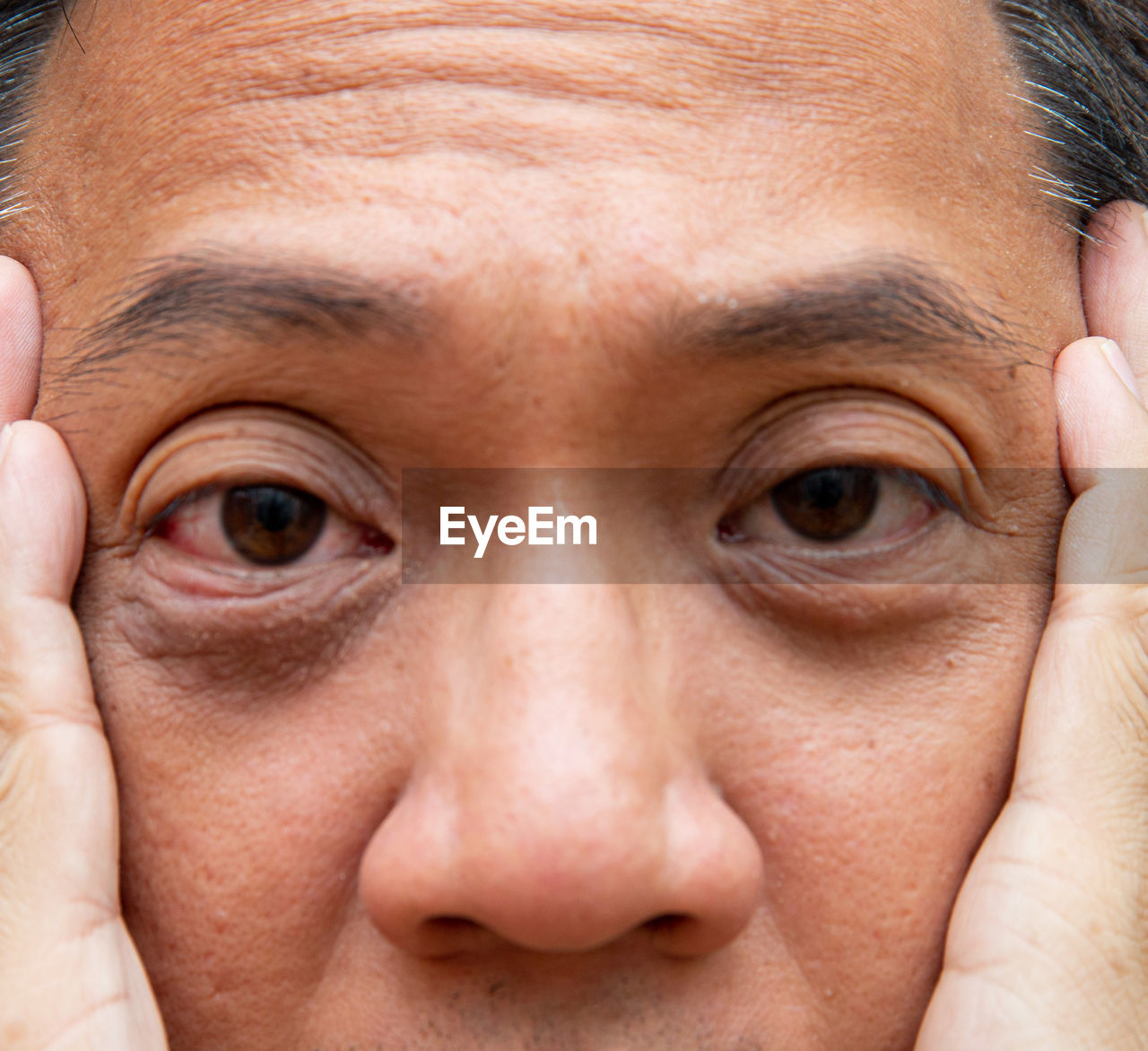 CLOSE-UP PORTRAIT OF A HUMAN FACE