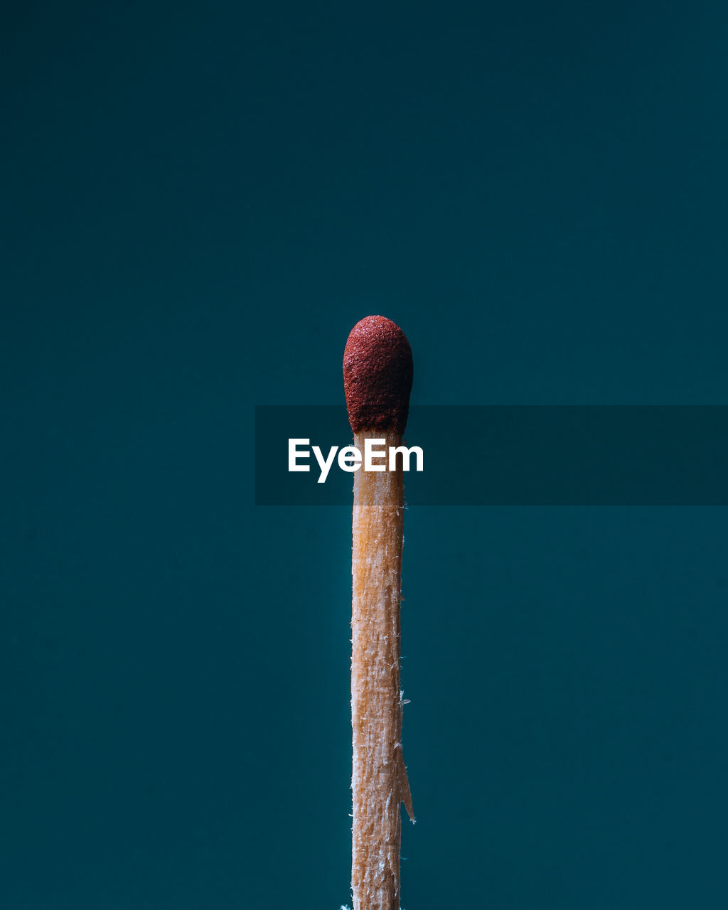 CLOSE-UP OF WOOD AGAINST BLUE SKY