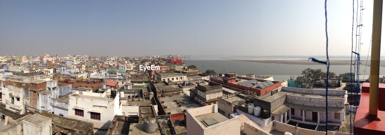 Aerial view of town against sky