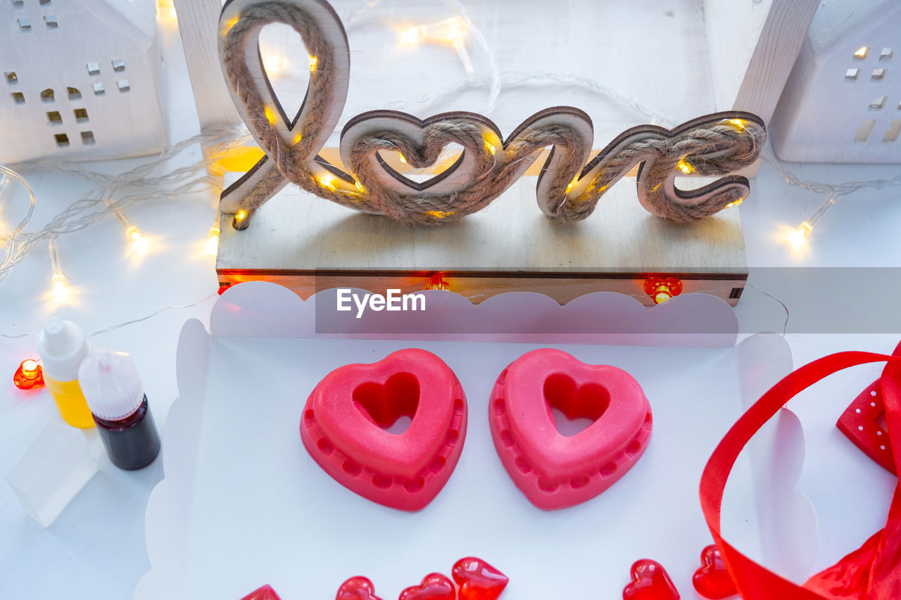 heart shape, font, love, heart, valentine's day, positive emotion, red, emotion, celebration, sweet food, sweet, no people, event, food and drink, indoors, decoration, food