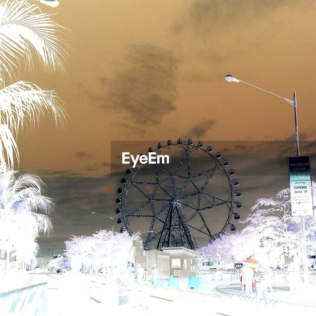 LOW ANGLE VIEW OF FERRIS WHEEL AGAINST SKY