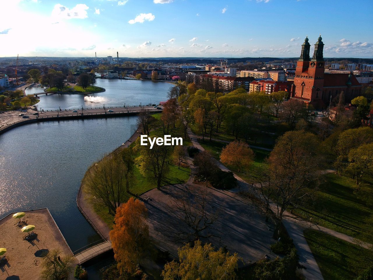 High angle view of river amidst buildings against sky