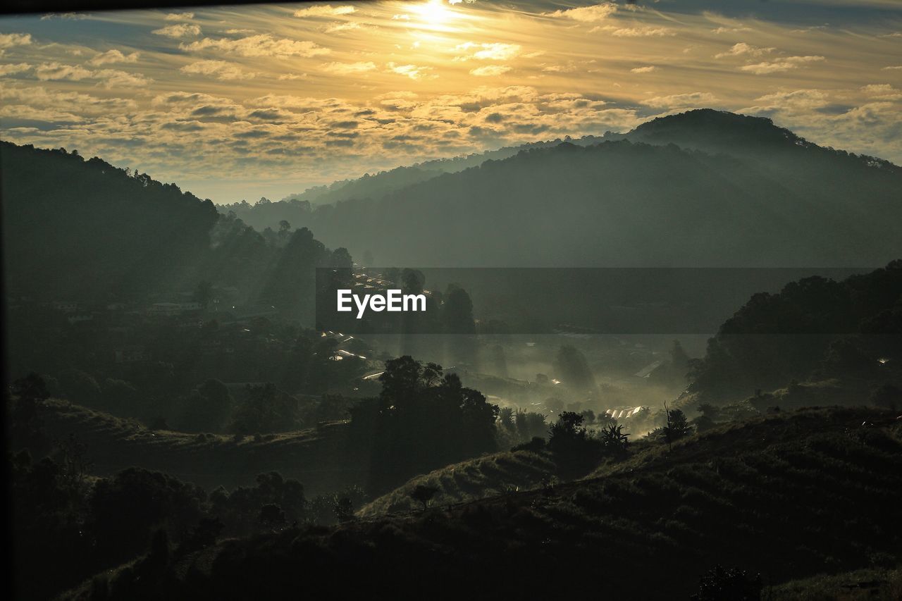 Aerial view of landscape against sky during sunset